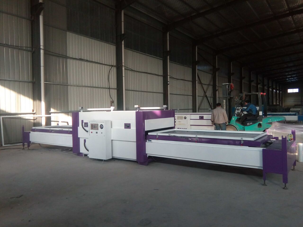 自動(dòng)貼膜機(jī)_機(jī)械欄目_